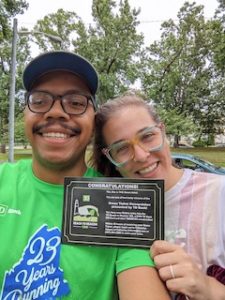 Carlos-Moran-and-wife-holding-green-ticket